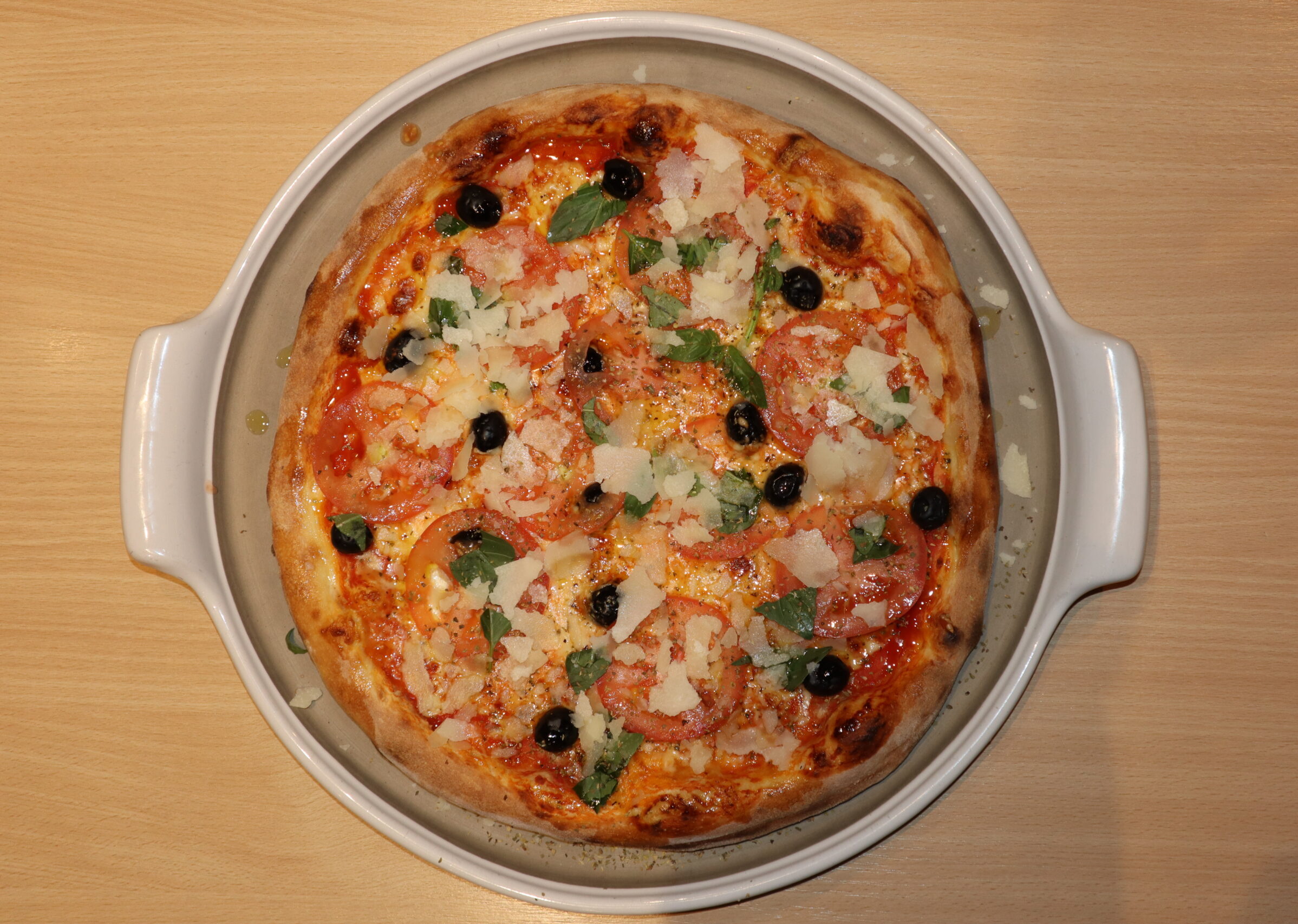 Traditionelle Pizza aus dem Steinofen - Pizza Karken